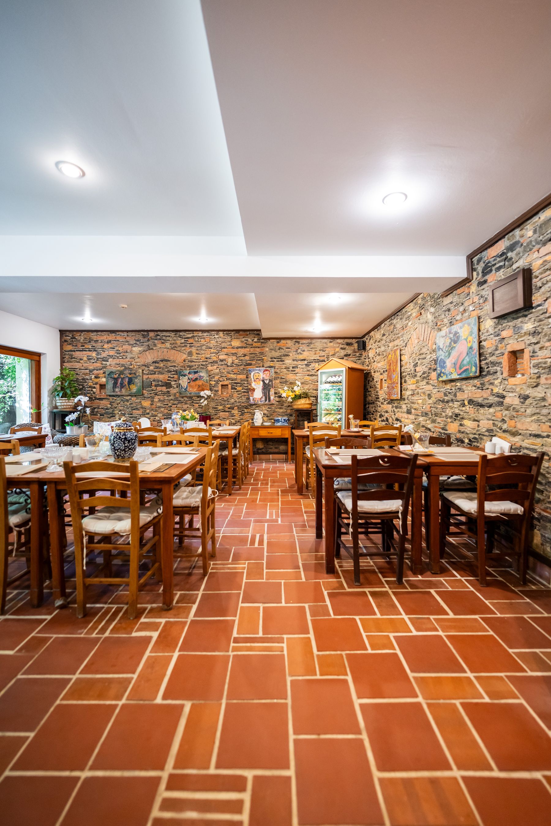 Restaurant tables set for dinner